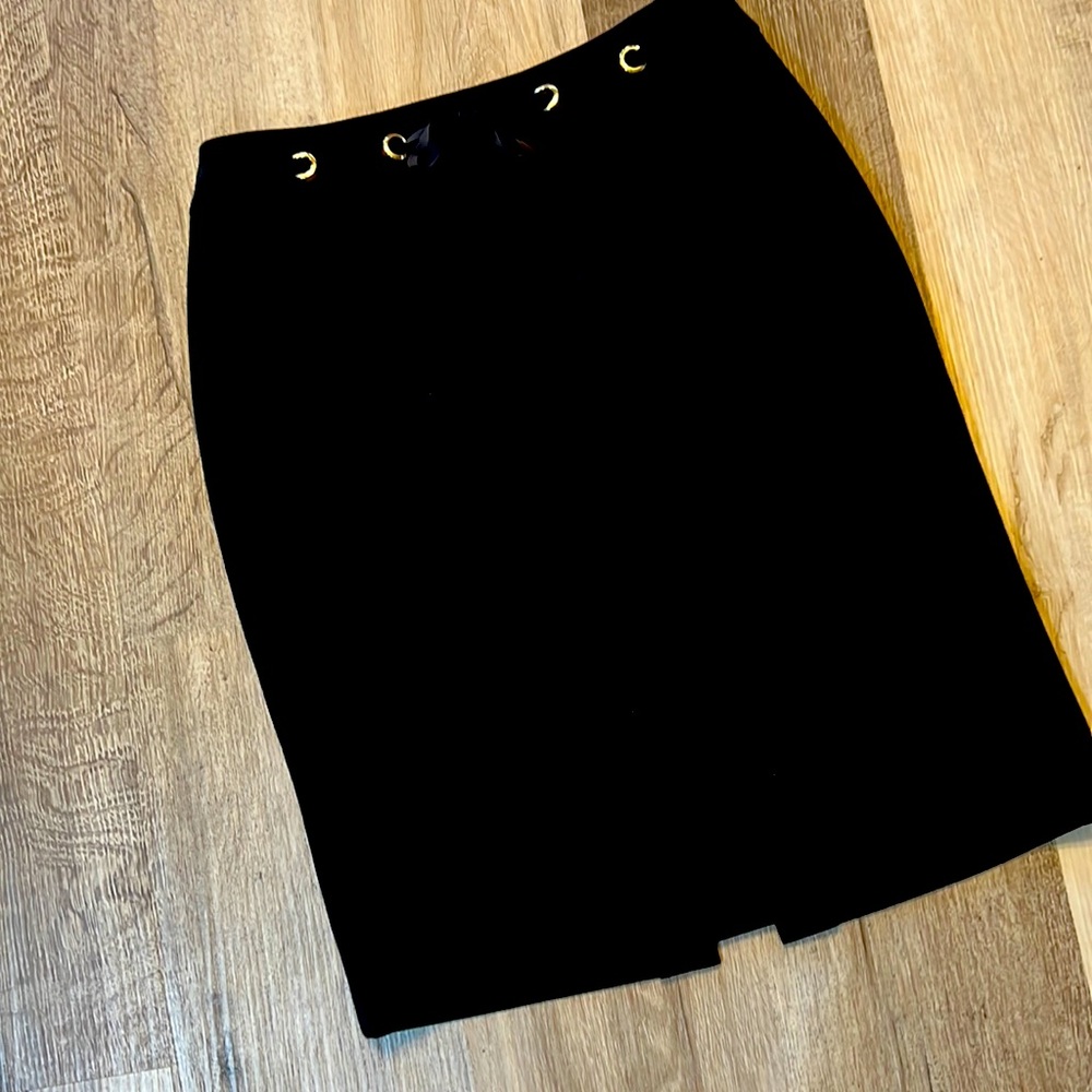 Tahara Black skirt with ribbon and hood grommet waist line feature